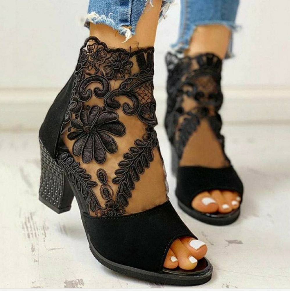 New- Lace inspired black booties. Size 7.5